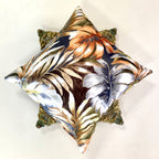 Decorative pillow with floral pattern on a white background