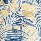 Pattern of blue palm leaves on a beige background