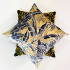 Decorative pillows with leaf pattern on a white background