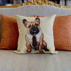Decorative pillow with a dog design on a couch with orange cushions