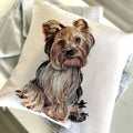 Embroidered pillow with a dog design on a neutral background
