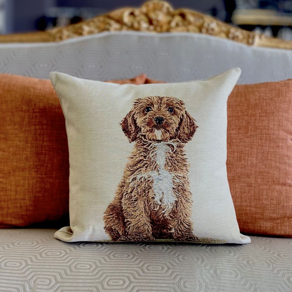 Decorative pillow with a dog illustration on a couch