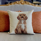Decorative pillow with a dog illustration on a couch