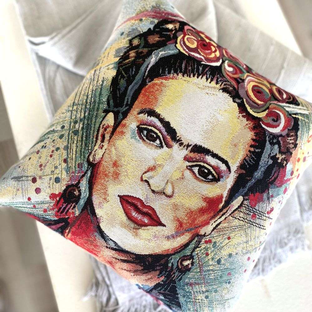 Decorative pillow with a stylized portrait design on a white background