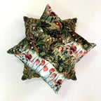 Decorative pillow with floral pattern on a white background