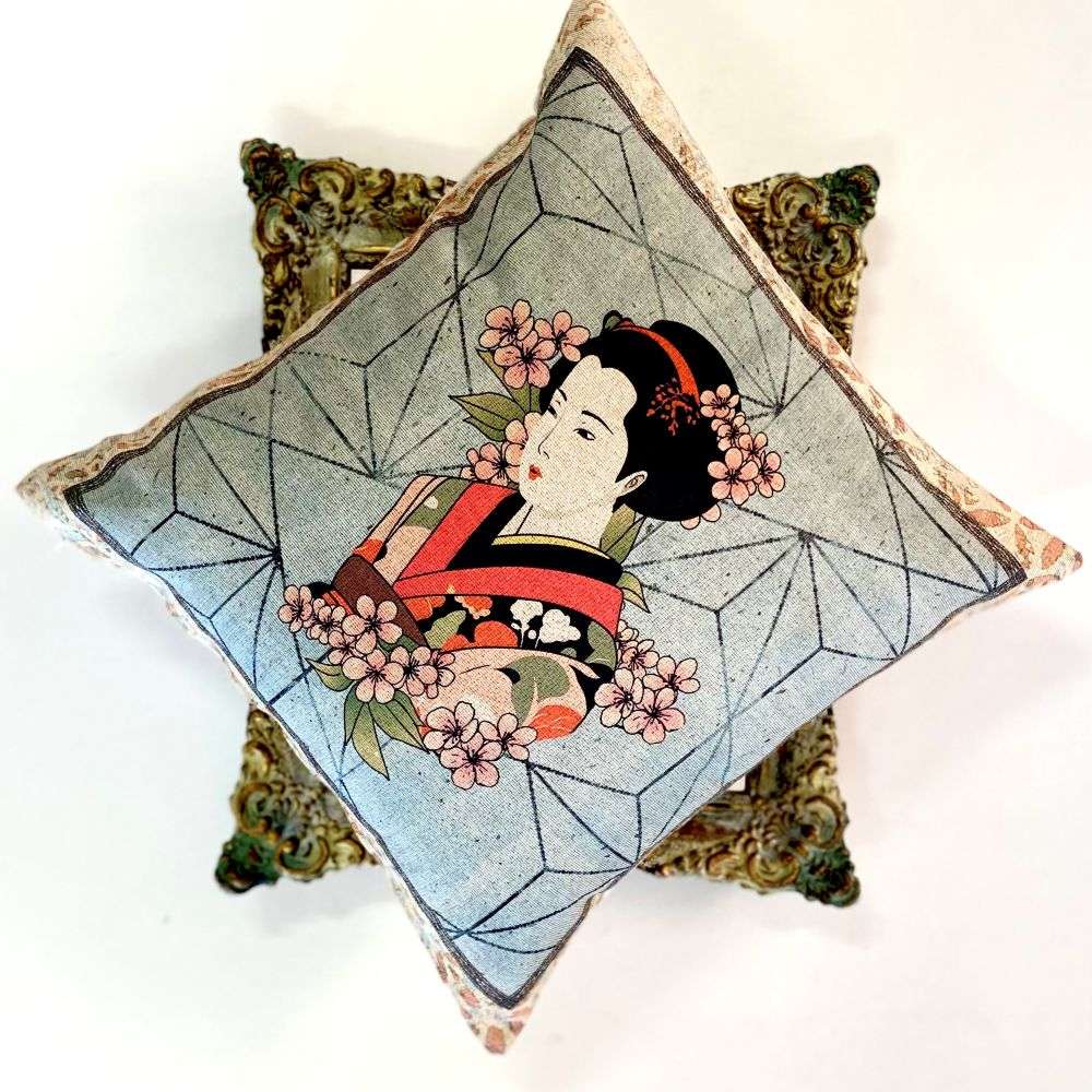 Decorative pillow with a geisha design on a white background