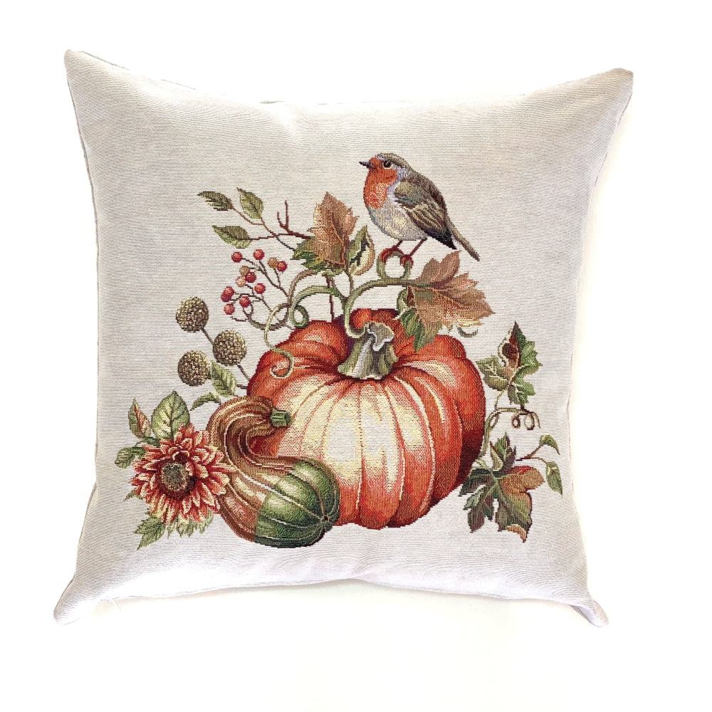 Decorative pillow with a robin, pumpkin, and autumnal elements on a white background